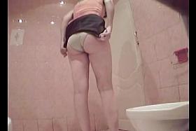 Toilet hidden cam shoots girl losing off panty and pissing