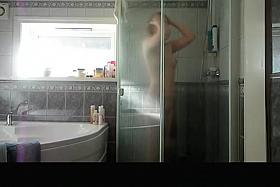 Blonde teen films her self in bathroom showering