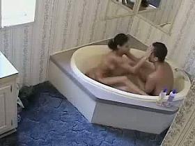 Voyeur bath video of a cute couple washing each other