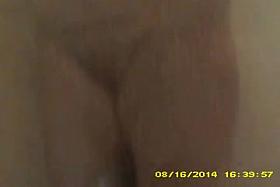 Close up of soap covered curvy wife in shower