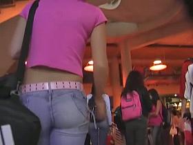 Amazingly juicy asses appear on a street candid voyeur video