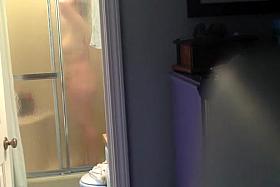 Wife secretly filmed taking shower