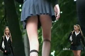 Seriously hot girl in fishnet knee highs in this upskirt attempt