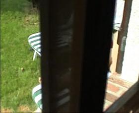 Guy made a window peep vid with a chick sunbathing