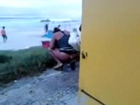 Kinky amateur spied pissing on the crowded beach