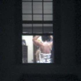 Fem is voyeured flashing her nude titties in window
