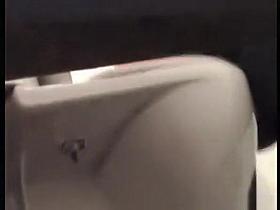 Voyeur hidden in the toilet cabin spies women peeing