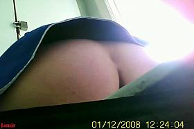 Mature ass hanging over the toilet caugth by a pee camera
