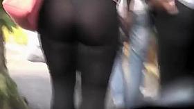 Thong is visible through stretched tights