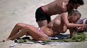 Topless Beach Girl in Small Bikini Shows Awesome Big Tits