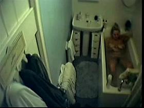 milf in bathtube cauht masturbating by hidden cam