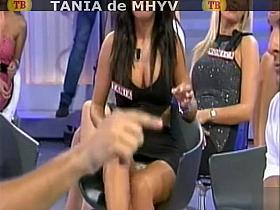 Busty babe on reality show gives upskirt flashes