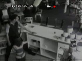 Security cam footage of a sexy brunnette giving head in a store