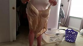 squeezing her bbw body & big tittys into her girdle