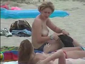 Sexy girls topless at beach - video