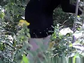 Woman caught changing in the forest