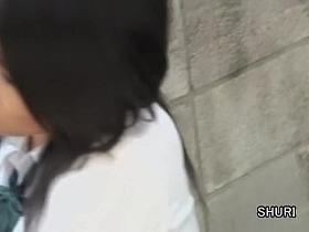 Asian school girl exposed during a skirt sharking.