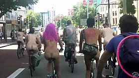 Foxy women and kinky men ride around on bikes completely naked