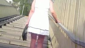 White skirt and tan stockings uptairs