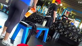 Strong girl caught by a gym voyeur