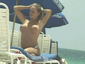 Aroused nipples on a nude beach vid