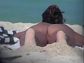Kinky voyeur takes a sexy trip to the nudist beach