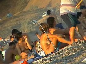 Ladies on the nudist beach exposed to the hidden cam