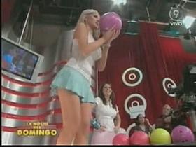 Hot little blonde makes upskirt magic bowling on TV