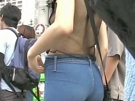 Brunette chick's tight little ass in jeans