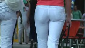 Two ladies with sexy asses walking down the street