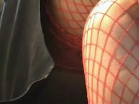 Upskirt video of a girl sitting in red fishnet stockings