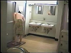 Absolutely naked amateur is spied on changing room spy cam