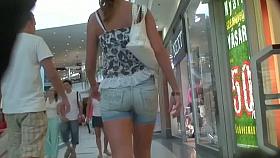 Beauty in short shorts caught on a candid street cam