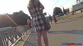 Upskirting video of a hot auburn gal with g-string