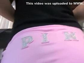 Tight ass and panties under her skirt