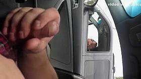 Jerking off at a stoplight as a woman watches