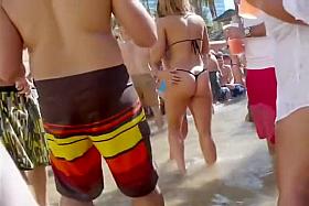 Honey in a flimsy bikini bottom gets her butt taped