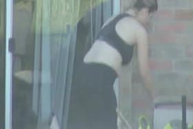 spying on neighbor in spandex