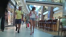Sexy street candid is being video taped by a voyeur guy