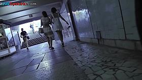 Two outstanding girlfriends' upskirt by the voyeur