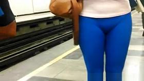 Blue leggings brunette girl at metro