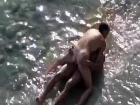 Couple fucking in the shallow water