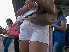 Cameltoe on chick wearing tight white jeans shorts