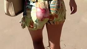 Those flowery shorts look good on her