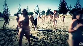 Huge nudist party with hundreds in the water