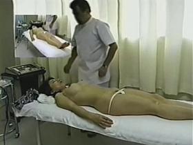 Busty Japanese enjoys a very hot massage on hidden camera