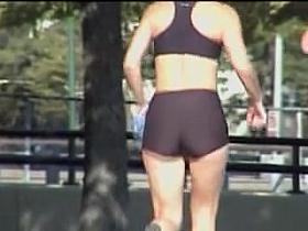Tiny tight shorts and top on the candid running babe 01d