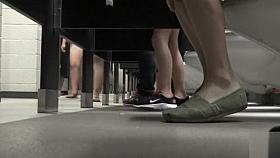 Foot fetish cam in busy public restroom