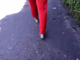 Sexy woman in red overalls