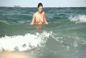 Nude 10 with wet shaking boobies and perfect ass in porno on the beach.